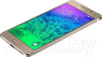 Смартфон Samsung G850F Galaxy Alpha (золотой) - вид лежа