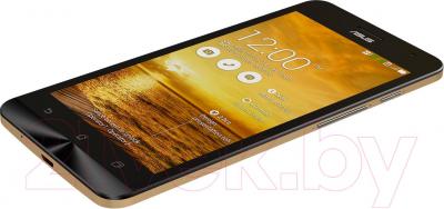 Смартфон Asus ZenFone 5 A501CG (16Gb, золотой) - вид лежа