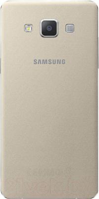 Смартфон Samsung Galaxy A3 / A300F/DS (золотой) - вид сзади