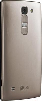 Смартфон LG Y70 Dual Spirit / H422 (черно-золотой) - вид сзади