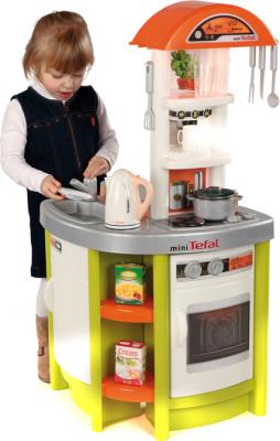 Детская кухня Smoby Кухня детская Tefal Studio (024666) - девочка за игрой