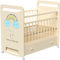 Детская кроватка VDK Nino колесо-качалка с маятником (слоновая кость) - 