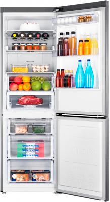 Холодильник с морозильником Samsung RB31FERNCSA/RS - пример заполненного холодильника