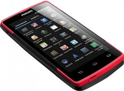 Смартфон Philips Xenium W7555 (Black-Red) - вид лежа