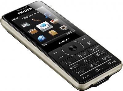 Мобильный телефон Philips Xenium X1560 (черный) - вид лежа