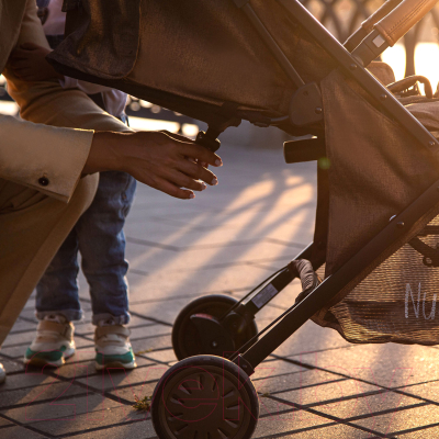 Изображение товара Детская прогулочная коляска Nuovita Giro Lux (бонди/черная рама)