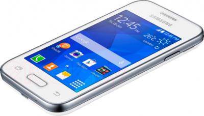 Смартфон Samsung G130H (белый) - вид лежа