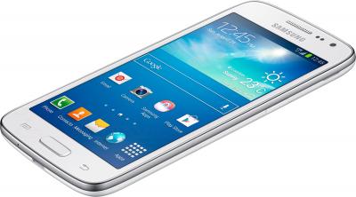 Смартфон Samsung G386F Galaxy Core LTE (White) - вид лежа