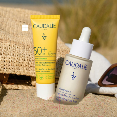 Набор косметики для лица Caudalie Сыворотка Vinoperfect+Солнцезащитный крем Vinosun SPF50+ (30мл+25мл)