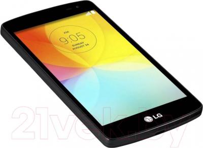 Смартфон LG L70+ L Fino / D290n (черный) - вид лежа