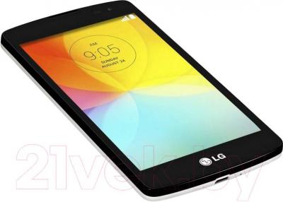 Смартфон LG L70+ L Fino / D290n (черно-белый) - вид лежа