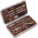 Миниатюра изображения товара Набор для маникюра Zinger MSFE-101 (коричневый чехол c серебристым инструментом)