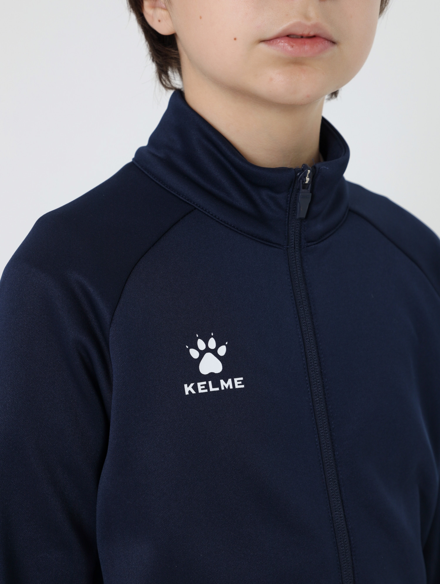 Олимпийка спортивная детская Kelme Children's Knitted Jacket fleece / 7461WT3143-416 (р.130, темно-синий) — фото 5