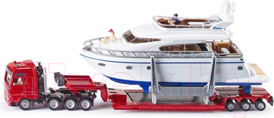 Трейлер игрушечный Siku Тягач с яхтой / 1849