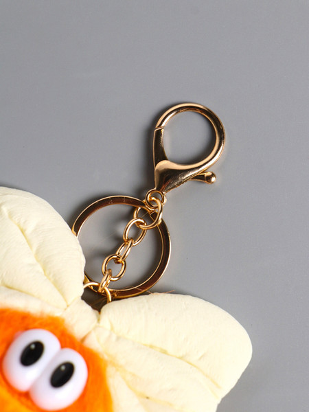 Изображение товара Брелок Sima-Land Пушистик на кольце. Чучундра с бантиком / 10904374 (оранжевый)
