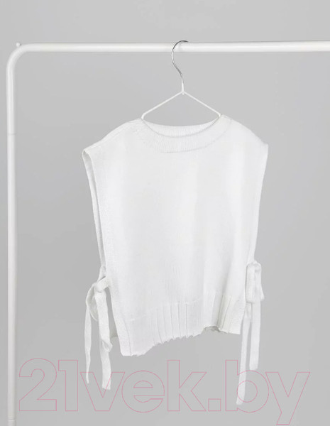 Изображение товара Жилет детский Amarobaby Bow / AB-OD24-KNIT10B/00-134 (белый, р.134)