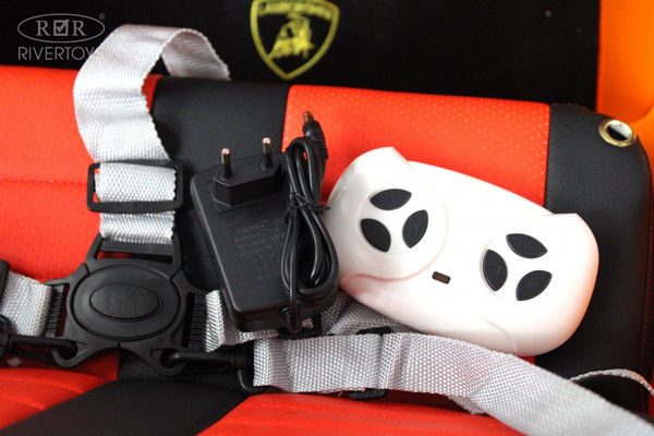 Изображение товара Детский автомобиль RiverToys Lamborghini Urus E777EE (оранжевый)