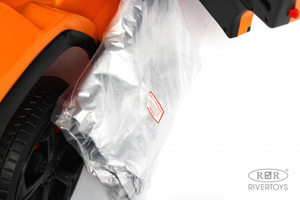 Изображение товара Детский автомобиль RiverToys Lamborghini Urus E777EE (оранжевый)