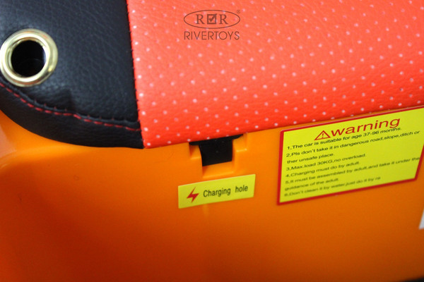 Изображение товара Детский автомобиль RiverToys Lamborghini Urus E777EE (оранжевый)