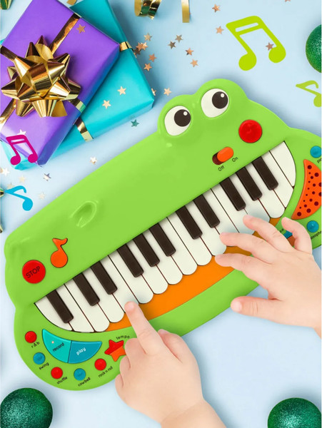 Изображение товара Музыкальная игрушка Battat Крокодил / B2680