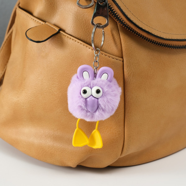 Изображение товара Брелок Sima-Land Пушистик на кольце. Большеглазая ворона / 10702209 (сиреневый)