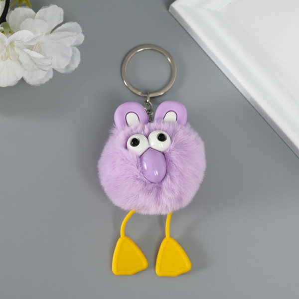 Изображение товара Брелок Sima-Land Пушистик на кольце. Большеглазая ворона / 10702209 (сиреневый)