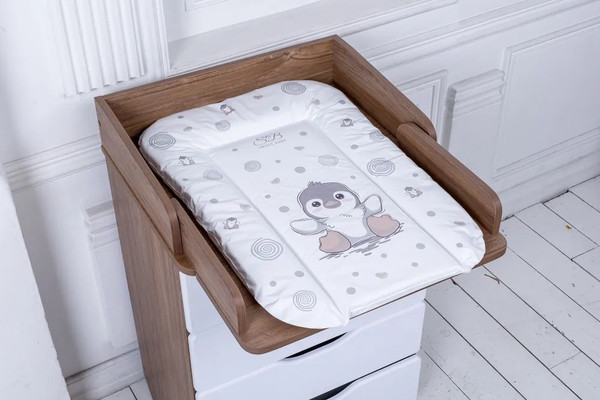 Изображение товара Пеленальный матрас Sweet Baby Pinguino New Crema 48x71 (пингвин бежевый)