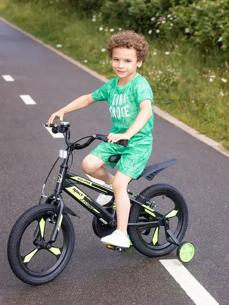 Изображение товара Детский велосипед Rant Eclipse 16 (черный/зеленый, разобранный, в коробке)