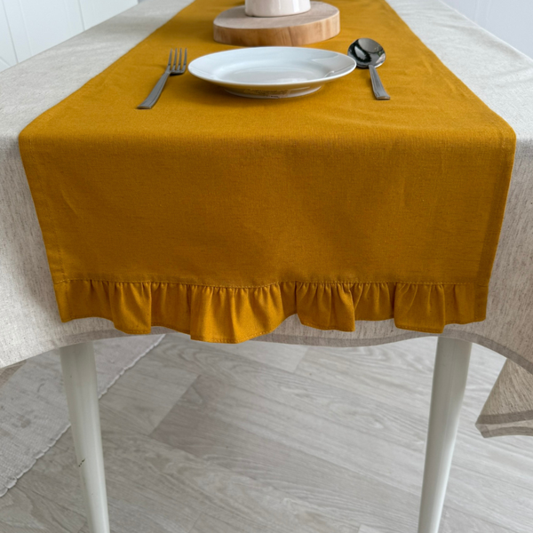 Изображение товара Дорожка на стол ОМурМебель 140x40см с рюшами (горчичный)
