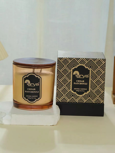 Изображение товара Свеча Arya Ароматическая Cedar Patchouli / 8680943254351 (янтарь)