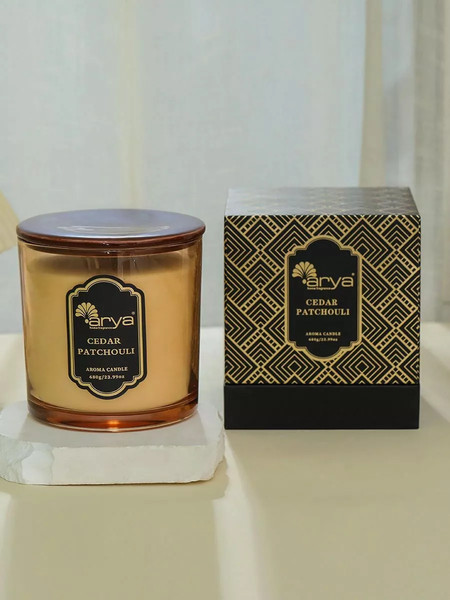 Изображение товара Свеча Arya Ароматическая Cedar Patchouli / 8680943254344 (янтарь)