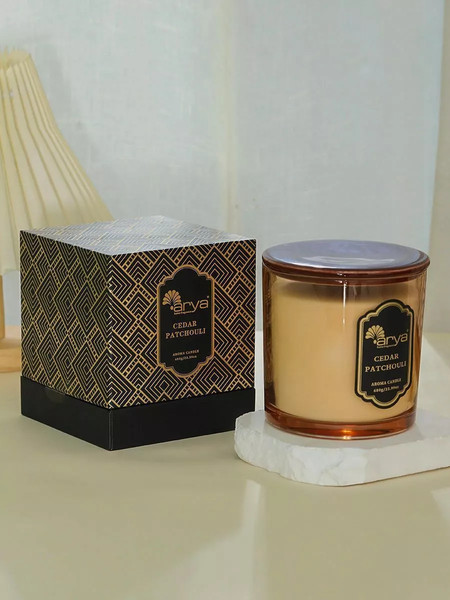 Изображение товара Свеча Arya Ароматическая Cedar Patchouli / 8680943254344 (янтарь)