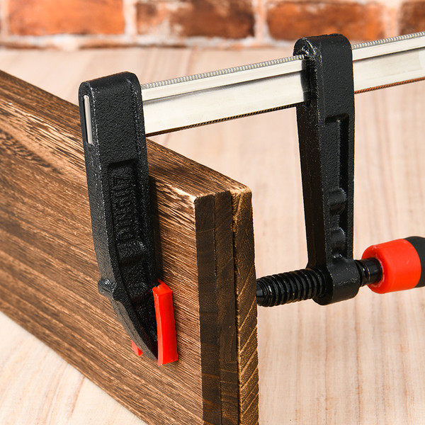 Изображение товара Струбцина Deli F-образная усиленная RS EDL110830Z (80x300мм, черный/красный)