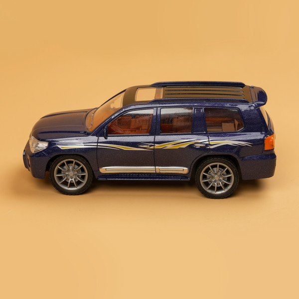 Изображение товара Игрушка на пульте управления Labalu Toyota Land Cruiser с УФ-краской, прозр. окнами 5-канальный RC