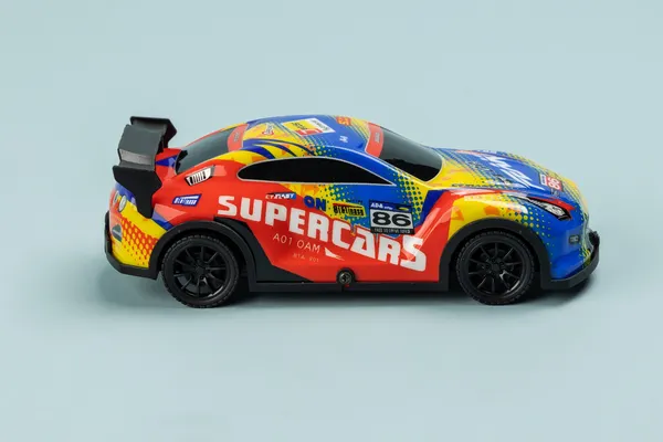 Изображение товара Игрушка на пульте управления Labalu PVC освещенный RC гоночный 4-канальный (бирюзовый)
