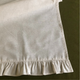 Миниатюра изображения товара Дорожка на стол ОМурМебель 140x40см с рюшами (серый)